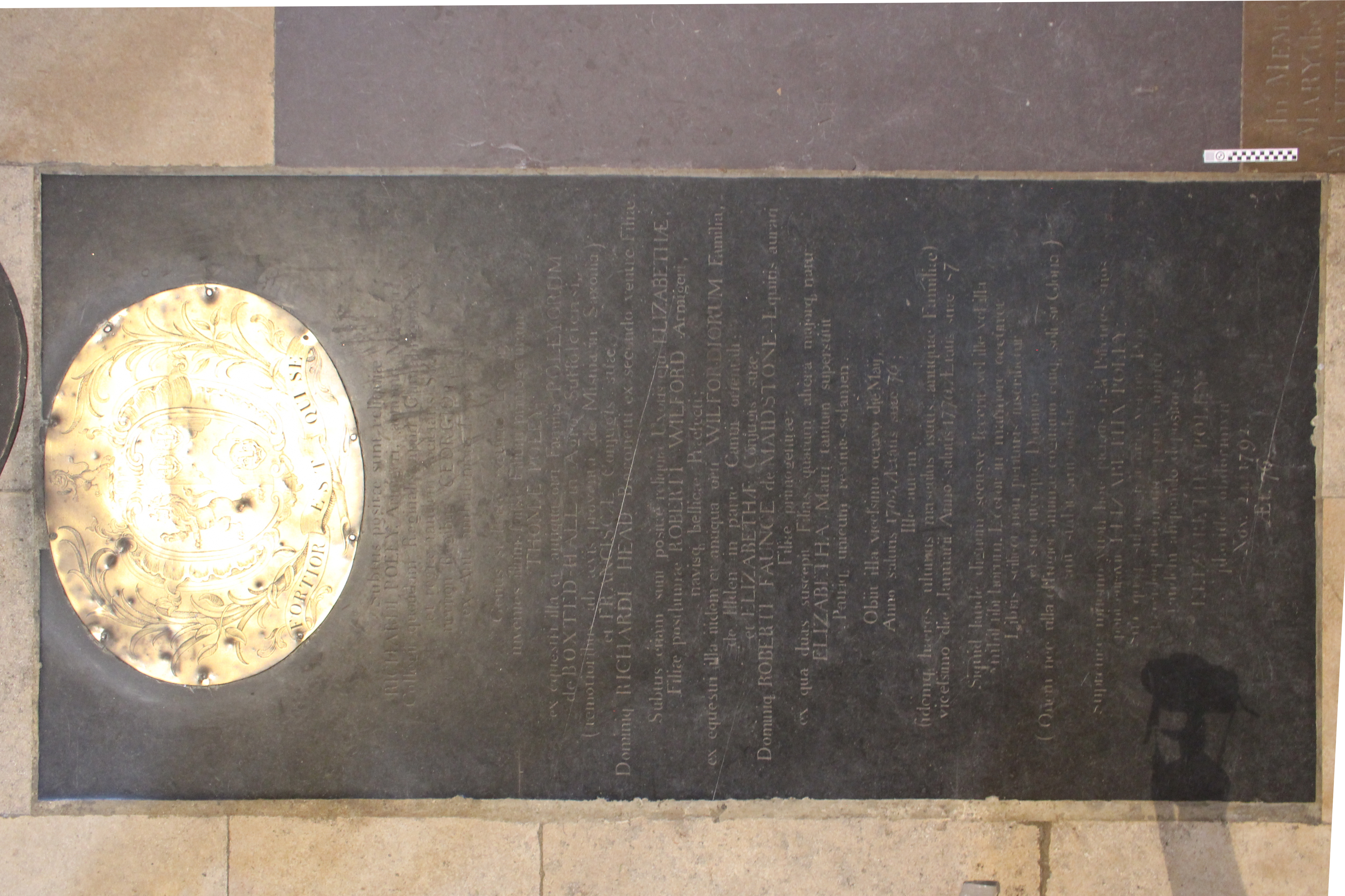 Photograph of the Poley family ledger stone in the north nave transept.
