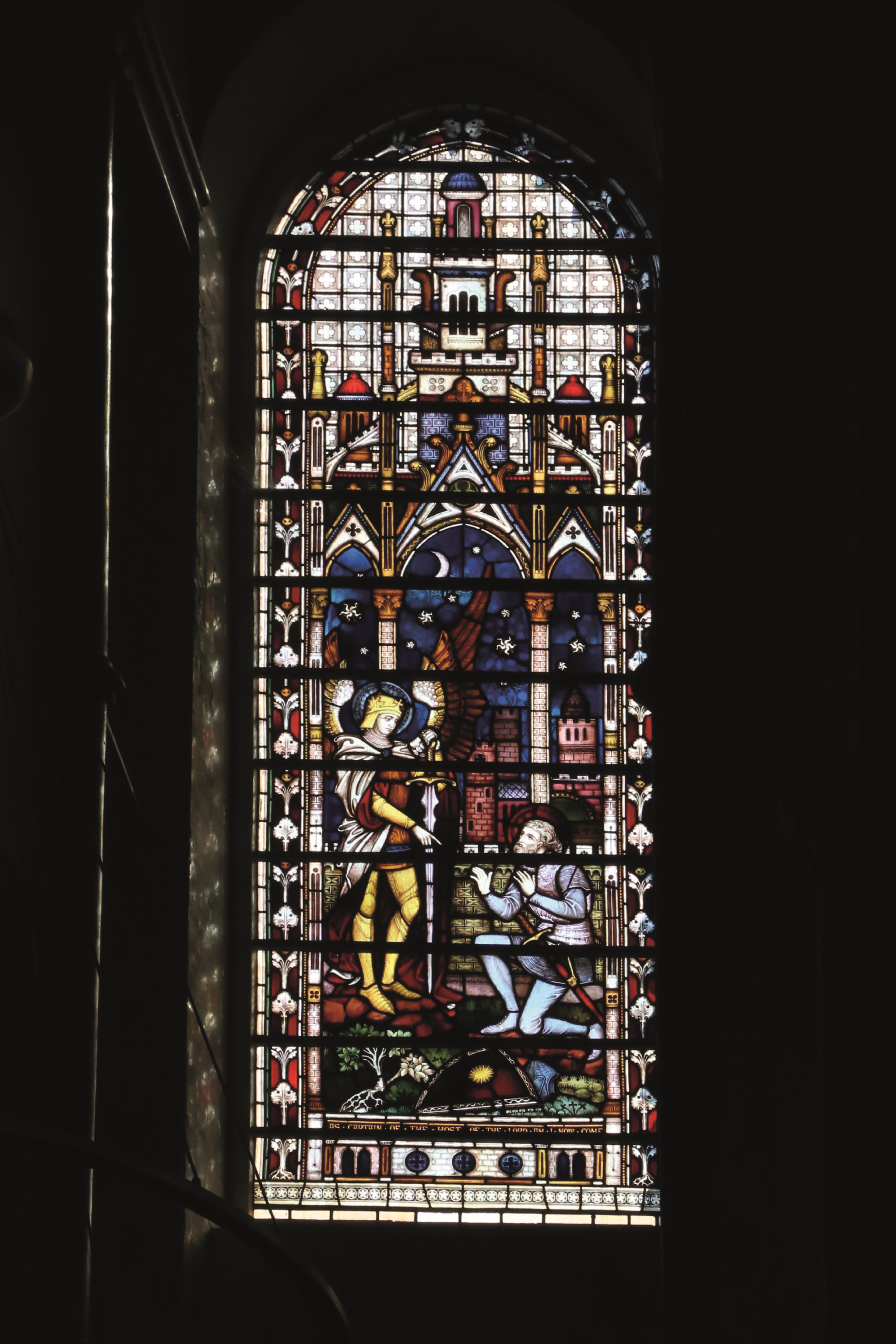 Photograph of the stained glass window dedicated to Captain William John Gill in the south quire transept.